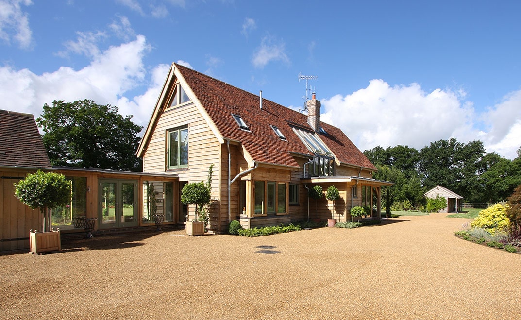 Exterior of Tall Tree House - Oak framed house