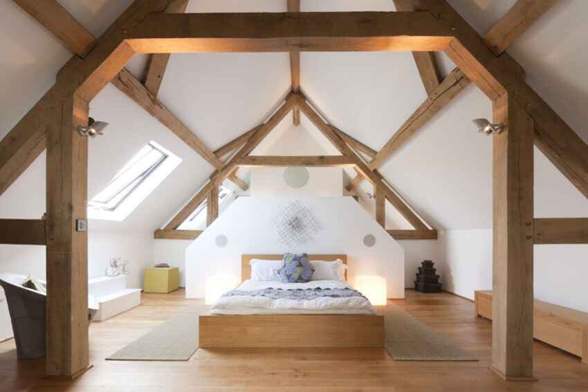Internal view of a bedroom with a storey and a half oak truss