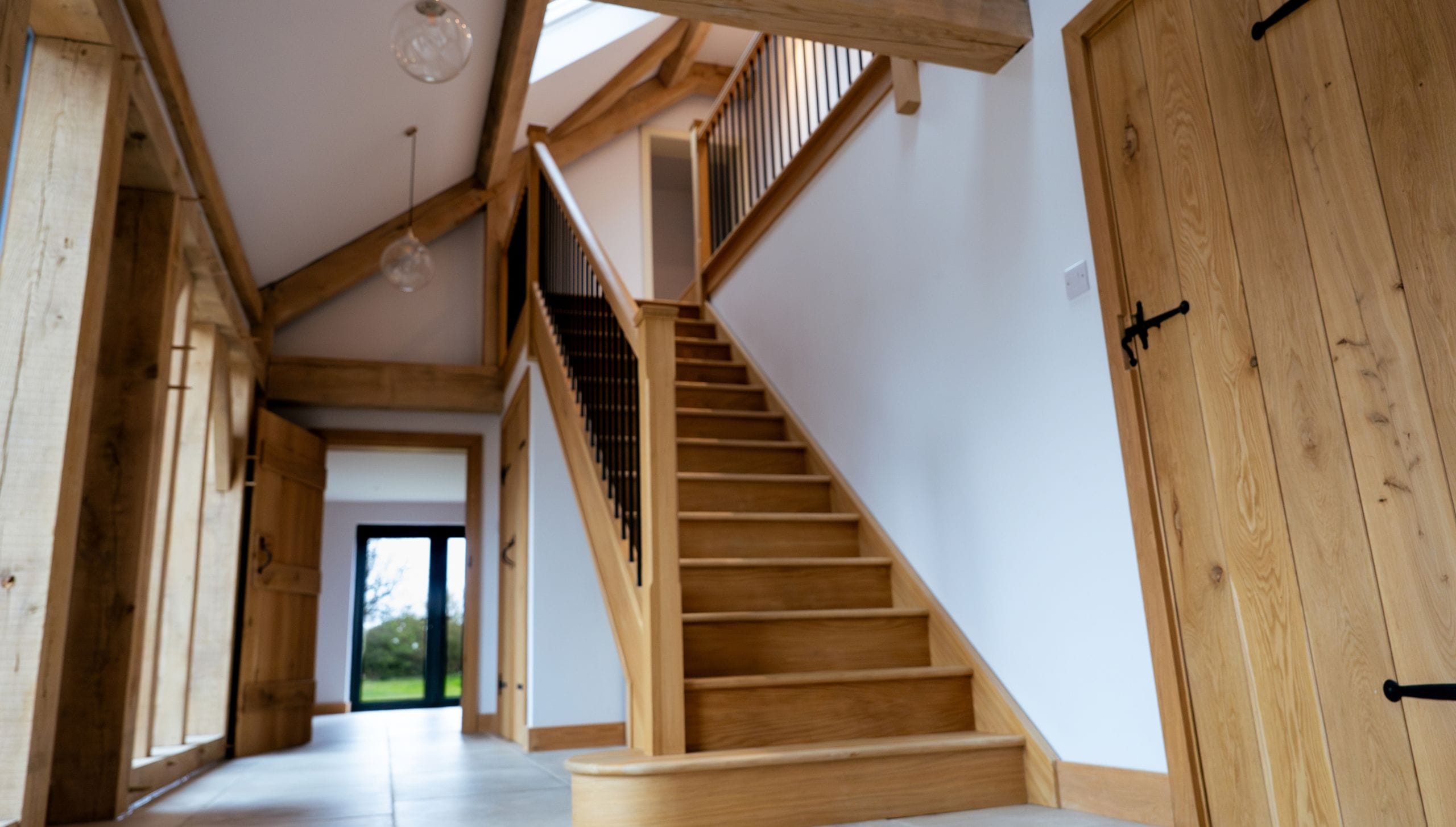 Rushmere Farm oak staircase featuring oak beams