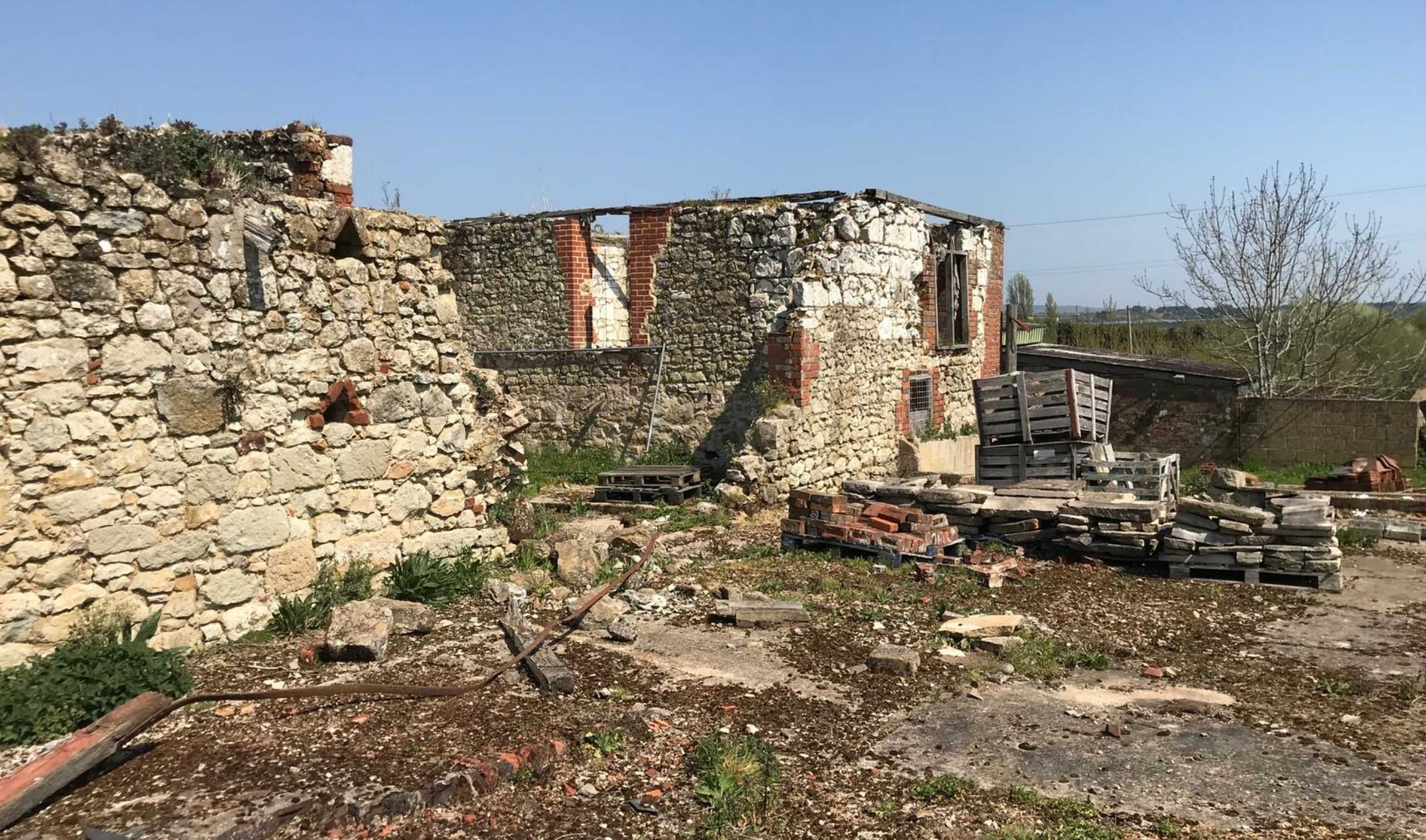 Oak frame barn conversion before image of old barn before restoration