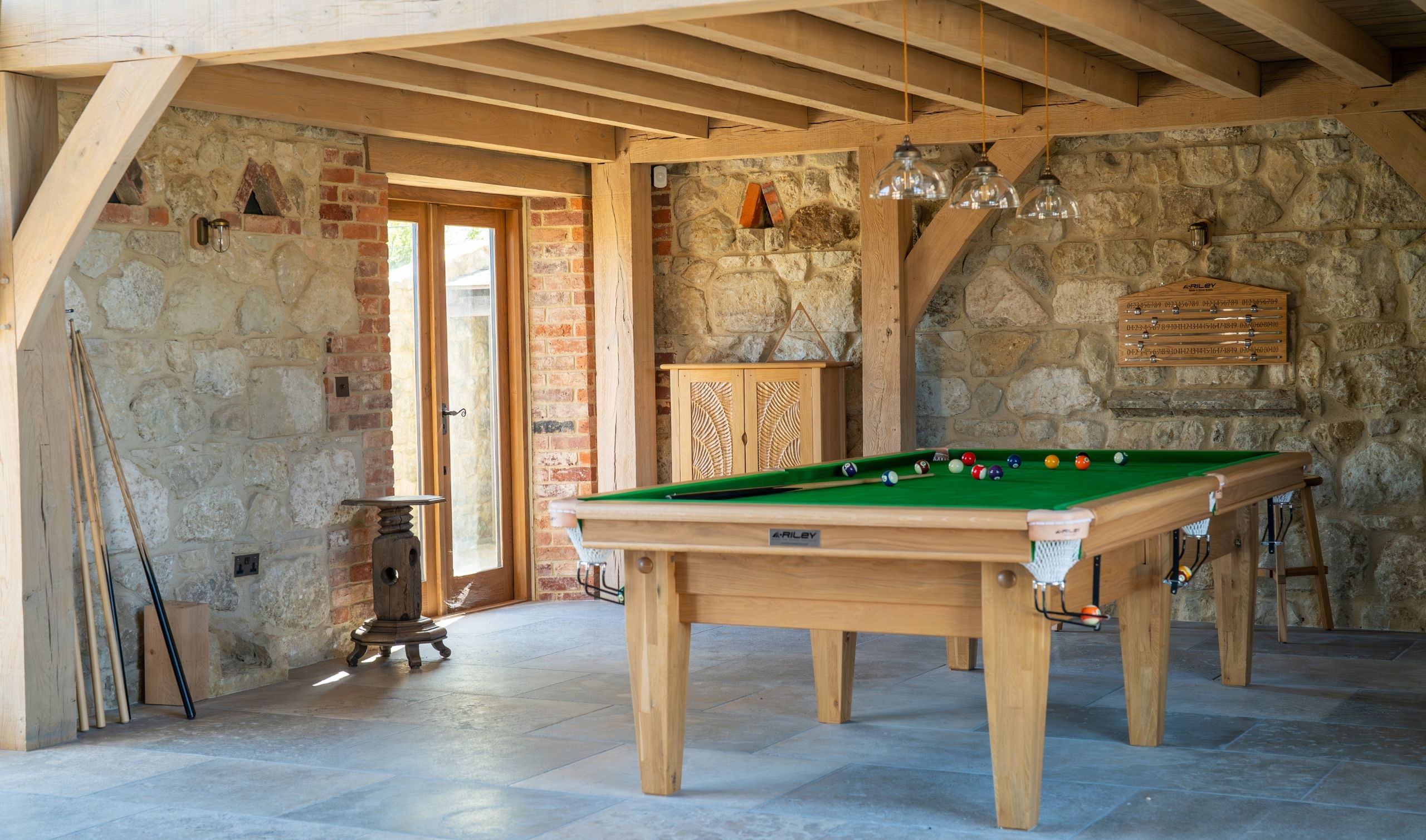 Oak frame barn conversion with games room and pool table